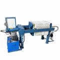 Fully automatic plate and frame sludge filter press