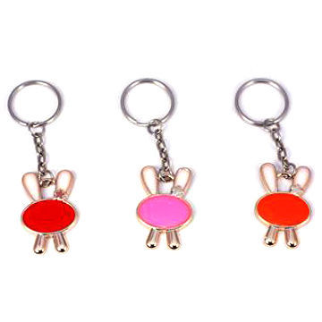 Porte-clés lapin en plastique avec bordure dorée