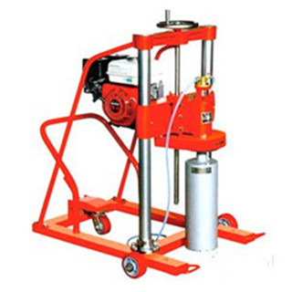 Concrete core drilling machine with petrol engine