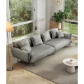 Elegante sofá salón con piernas