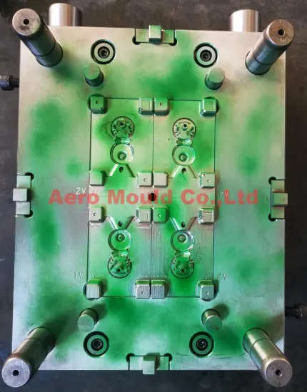 Plastic flip top cap mould maker