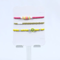 Bracelet élastique de perle en verre de visage smiley jaune