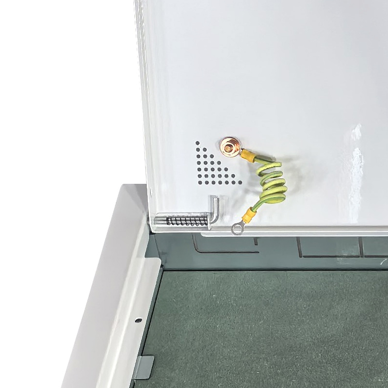 Spring latch and ground wire design for ICT security box