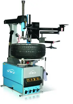 Automatic tilting post tire changer with help arm