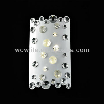 LED crystal wall sconce in glossy white
