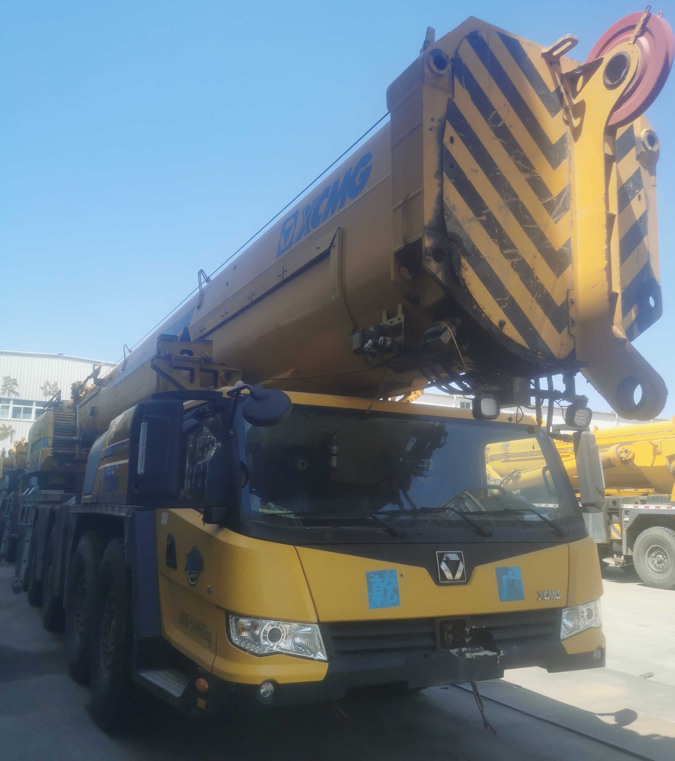Side-profile-shot-of-used-truck-mounted-crane-with-extended-outriggers-XCA460