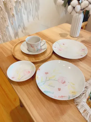 Porcelain rendered coffee cups, plates, bread plates