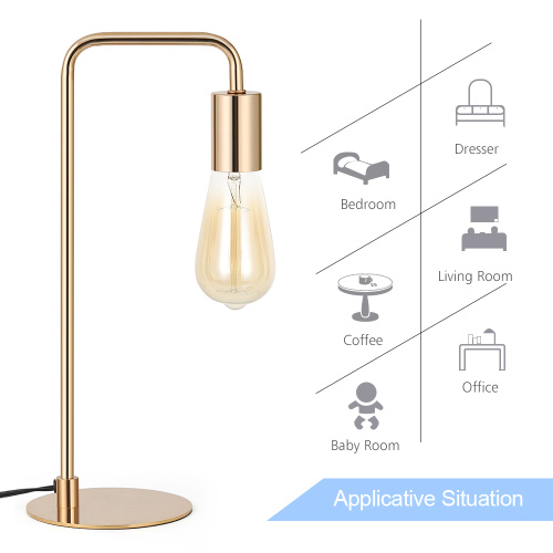 Kleine goldene Metalllampe für Bett