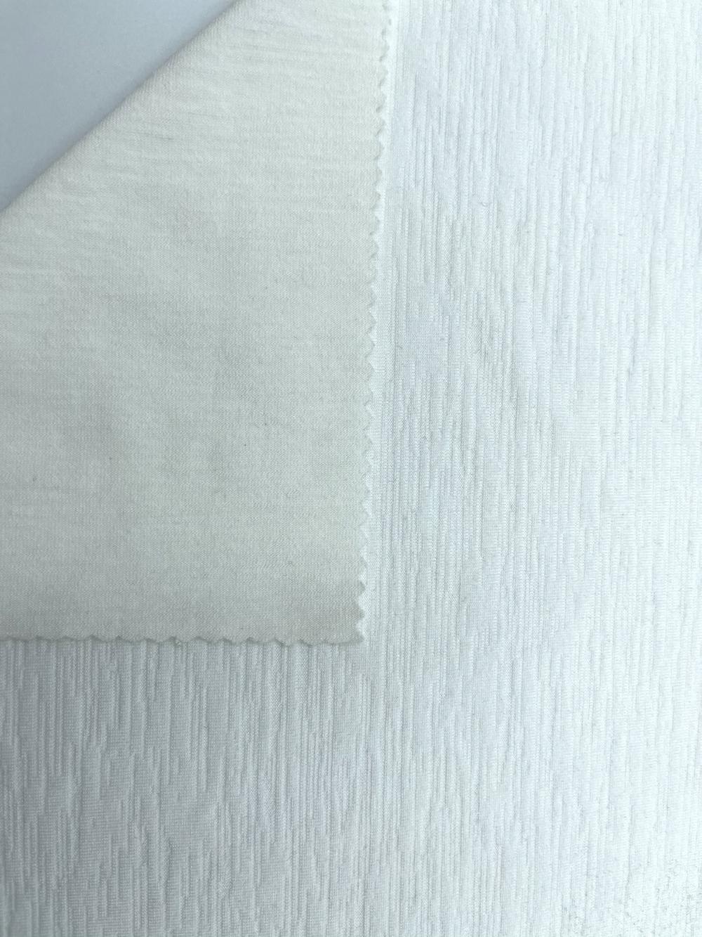 Tissu texturé 67% polyester 29% rayonne 4% élasthanne