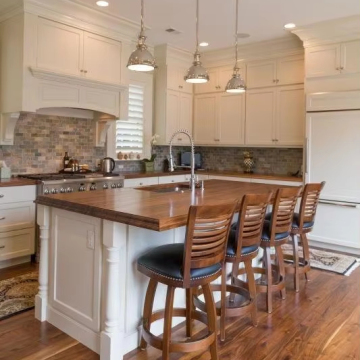 Luxury Marble Kitchen Counter with Wooden Island and Custom Cabinets