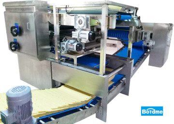 Reciprocating horizontal laminator baking
