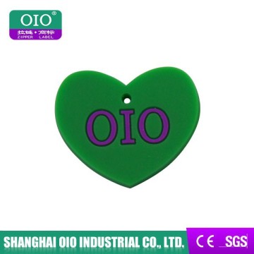 OIO Heart shape rubber pvc label design logo for garment clothing & jeans