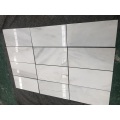 azulejos de mármol blanco de seda