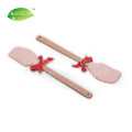 Spatule à beurre de silicone avec manche en bois caoutchouc