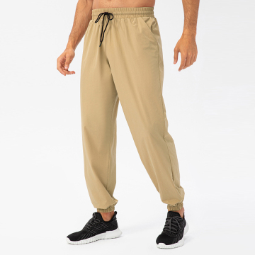 Herrenhosen für schnell trockene Fitness: Streetwear mit Taschen, lose Freizeit, atmungsaktives Jogging und Laufsporthosen für den täglichen Gebrauch