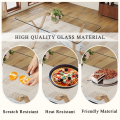 Elegant Glass Surface Dining Table with Cockroach Leg