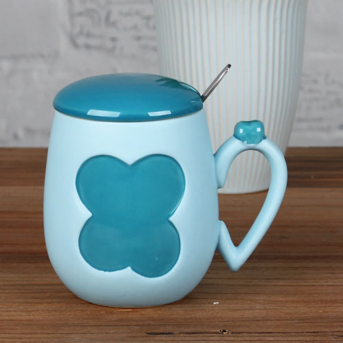 four leaf clover and heart coffee mug