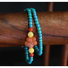 Pulsera de doble capa de flor de melocotón turquesa