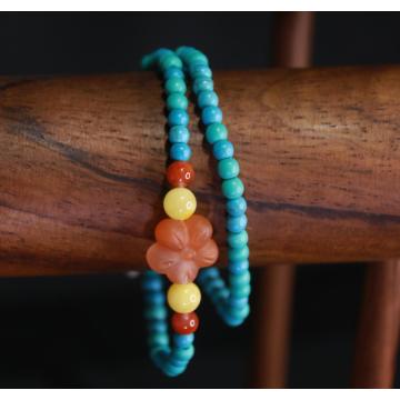 Pulsera de doble capa de flor de melocotón turquesa