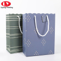 Solid color carrier portable paper bag with wavy