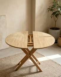 Natural bamboo folding tables are used for activities.