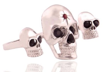 Double finger skull rings with black diamond eyes