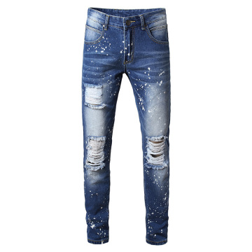 Мужские рваные джинсы с брызгами краски на заводе оптом на заказ