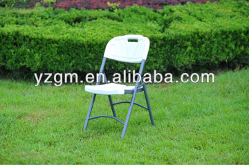 White plastic folding chair, outdoor furniture