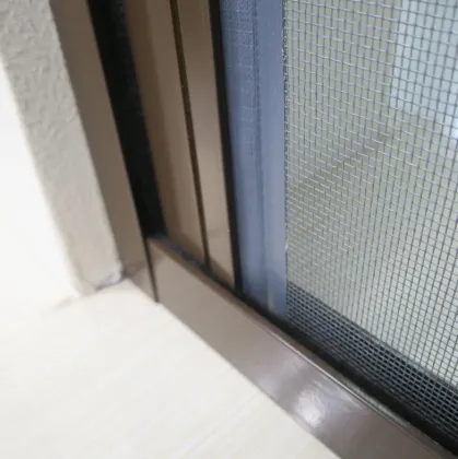 Aluminum sliding and retractable screen door