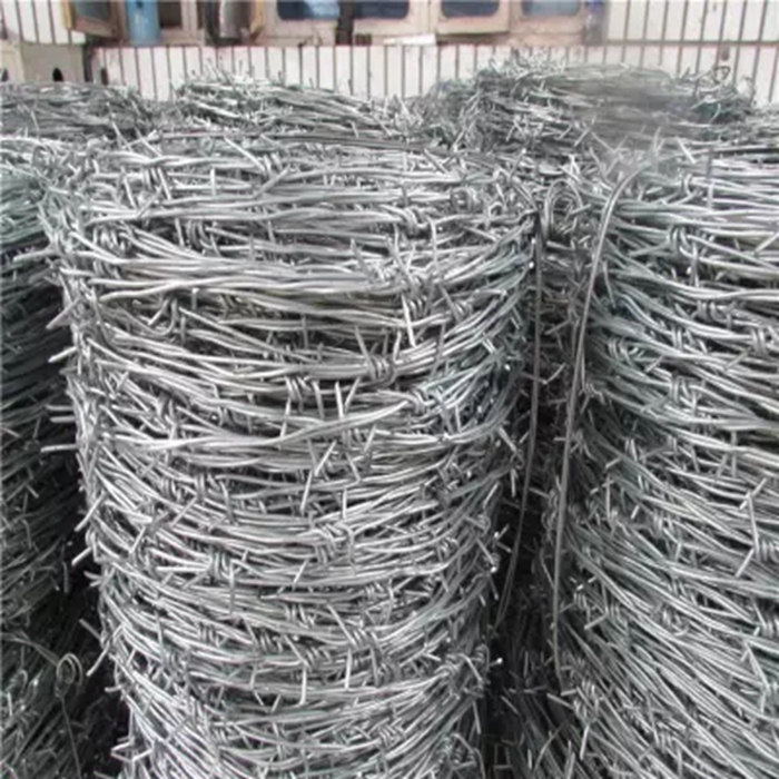 Prezzo di filo spinato zincato all'ingrosso per design di recinzione a filo spinato