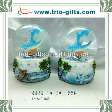 Glass globe polyresin dolphin beach design