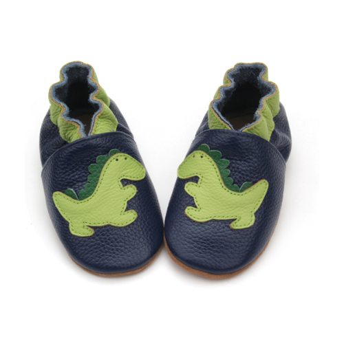 Zapatos encantadores de cuero suave del bebé del dinosaurio