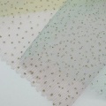 Rete in poliestere con stampa laminata a pois dorati a strisce sfumate