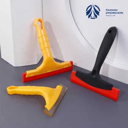 Handle-Mounted Squeegees for Home Surface Maintenance
