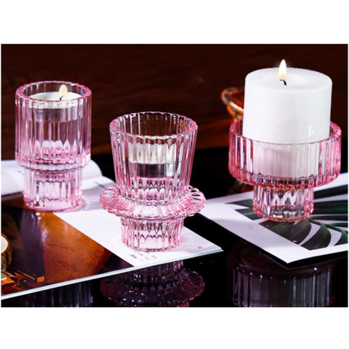 Petit bougeoir en verre de couleur rose en forme de nervure