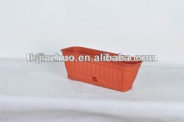 bed with plastic flower