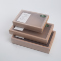 Boîtes en papier kraft marron avec manche claire