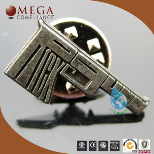 Antique silver lapel pins gun shape
