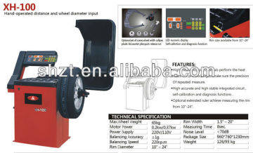 Hand-operated wheel balancer XH-100