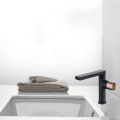 Artistic brass hot and cold water basin faucet