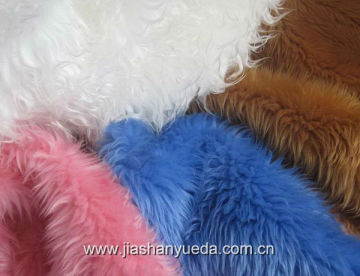 Tumbling long pile faux fur for fashion garments
