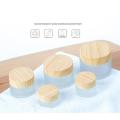 Wood grain glass frosted face cream bottled separately