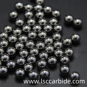 Carbide balls for controlling the flow of valves