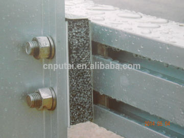 Shock absorbing aluminum foam buffer for roadside guardrail