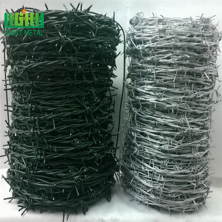 Galvanized barded wire fence