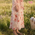 Kleid mit Aquarell-Blumendruck und Rüschensaum