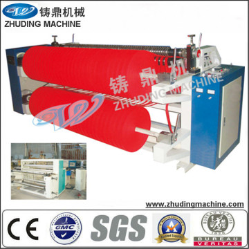 NONWOVEN FABRIC SLITTING AND REWINDING MACHINE