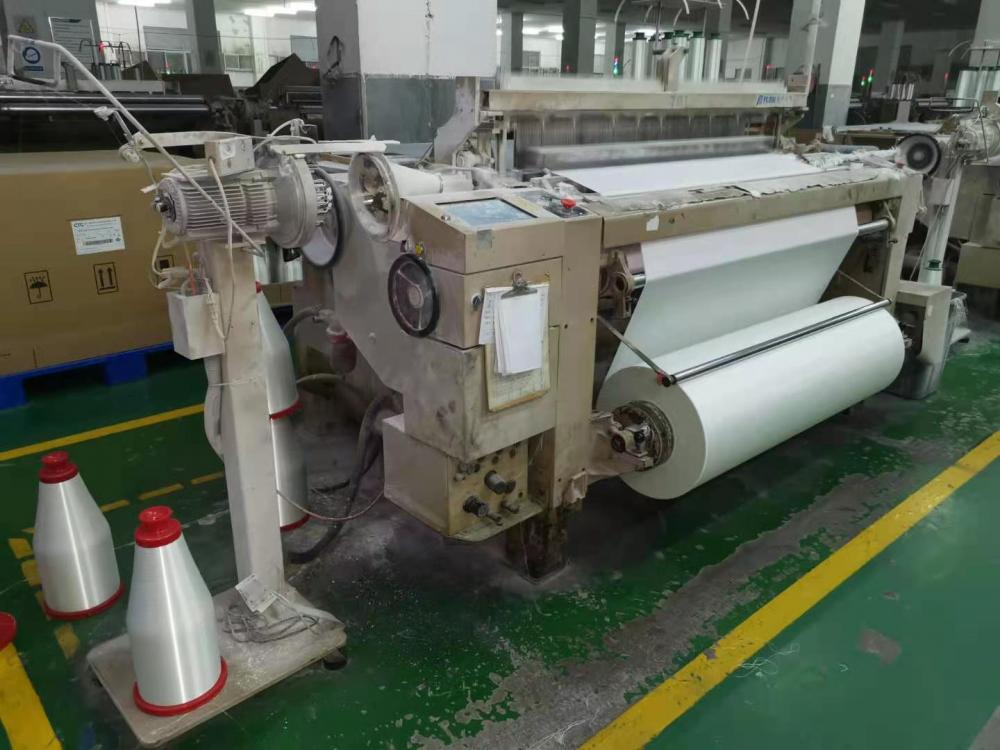 Glass fiber air jet loom