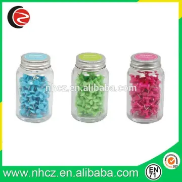 color drawing pin in glass jar
