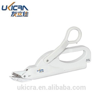 Mini electronic scissor for cuttig clothes shewers for cutting